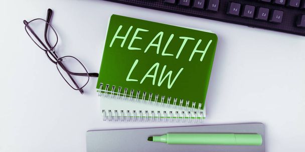 Text caption presenting Health Law, Business overview law to provide legal guidelines for the provision of healthcare - Foto, Imagen