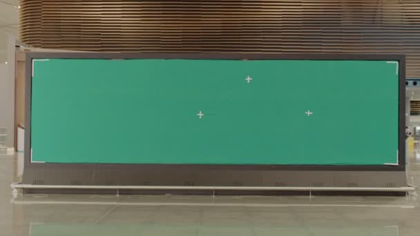 Airport Terminal: Green Screen Billboard, Color Keyed Arrival Screen, Mockup AD Area. - Кадры, видео