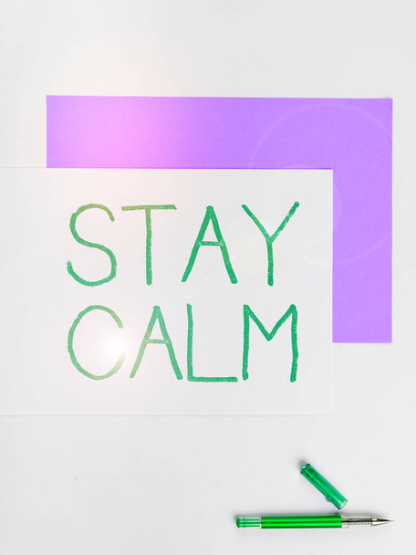 Sign displaying Stay Calm, Internet Concept Maintain in a state of motion smoothly even under pressure - Photo, image