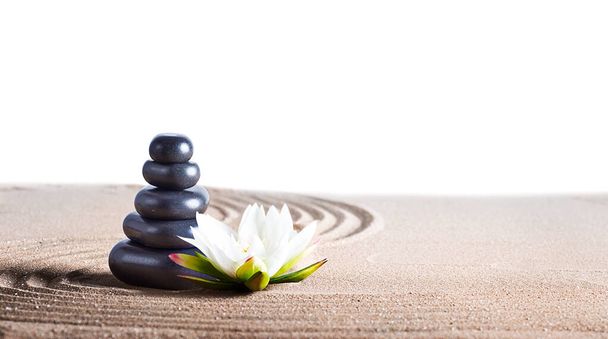 Massage stones on the sand. relaxation concept - Foto, Imagen