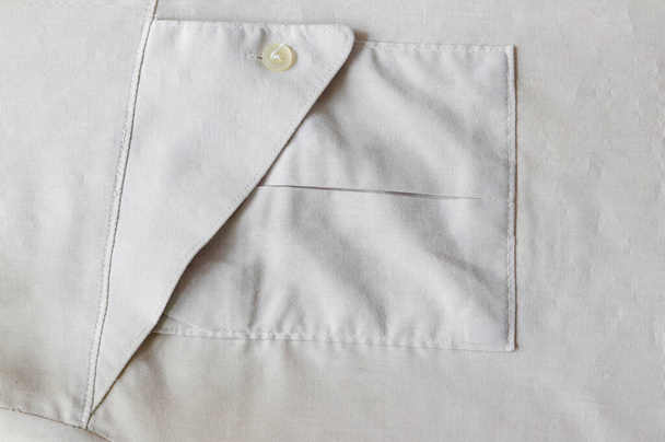 folded jacket on a white background - Фото, изображение
