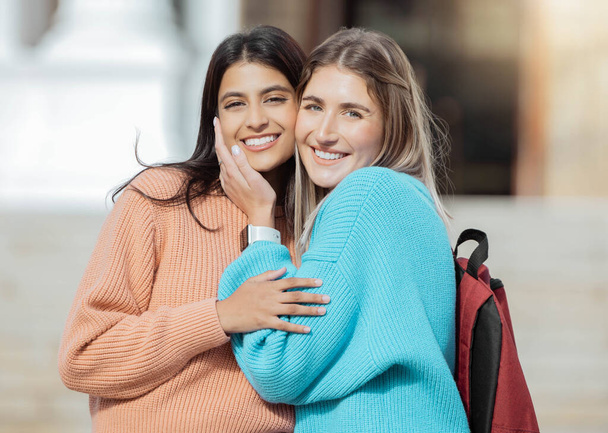 Girl friends, students and portrait of women together on campus with smile, diversity and hope for future. Friendship, university and happy college people hug outside, gen z woman and friend embrace - Fotó, kép