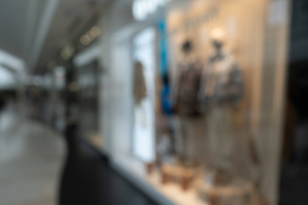 Blurred Fashionable Clothes Showcase, Abstract Boutique, Window Display in Shopping Mall, Blur Shop, Defocused Shopping Centre, Blurry Clothes Showcase - Фото, изображение