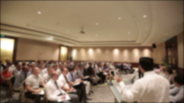 Many people came together at a conference or seminar. Blurred background for title. - Footage, Video