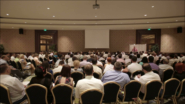 Many people came together at a conference or seminar. Blurred background for title. - Materiaali, video