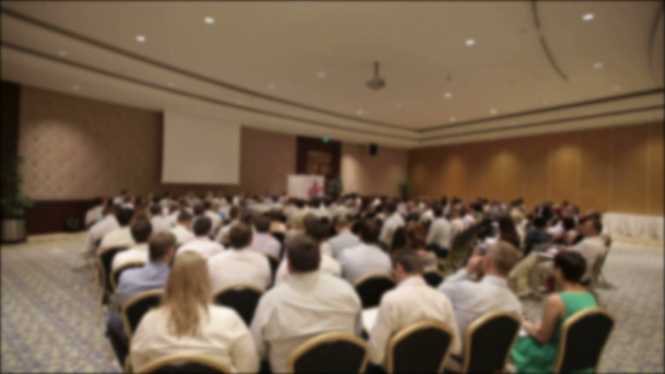Many people came together at a conference or seminar. Blurred background for title. - Materiaali, video