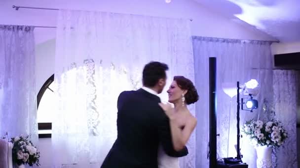 Loving newlywed couple dancing the first dance at wedding - Footage, Video