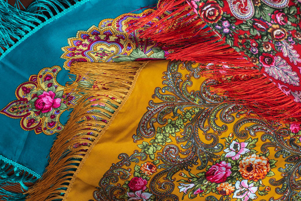Colorful Boho flowers fabric. Fashionable collection of accessories for women. Detail of wardrobe - Zdjęcie, obraz