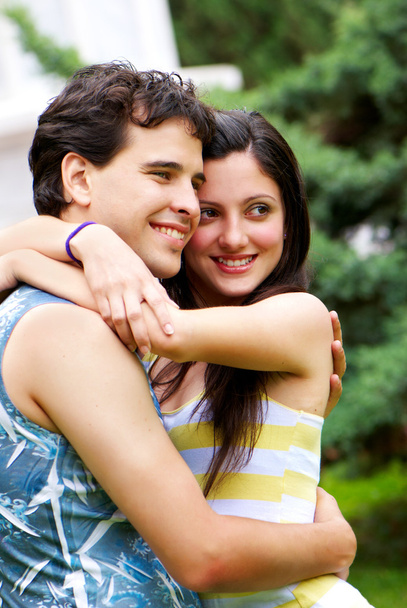 Portrait of young, happy couple against the nature - Photo, Image
