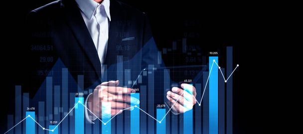 Businessman analyst working with digital finance business data graph showing technology of investment strategy for perceptive financial business decision. Digital economic analysis technology concept. - Fotoğraf, Görsel