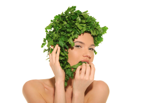 Beautiful woman with hat of parsley - Foto, afbeelding