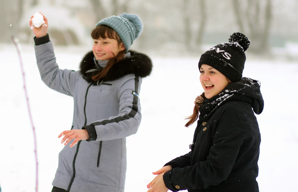 Girls player to snowballs - Photo, Image