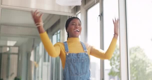 Creative business woman, smile and throwing papers in celebration, victory or accomplishment walking in office. Happy African American female smiling and celebrating paperwork for startup completion. - Video