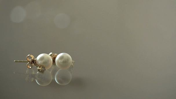 Gold earrings with pearls - Footage, Video