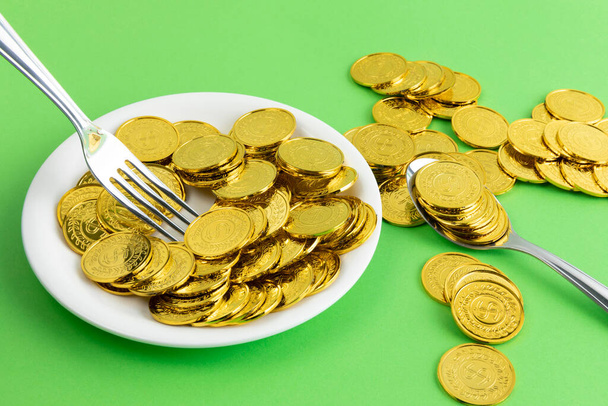 conceptual creative photo of monetary inflation, economic recession, crisis, coins and plate - Φωτογραφία, εικόνα