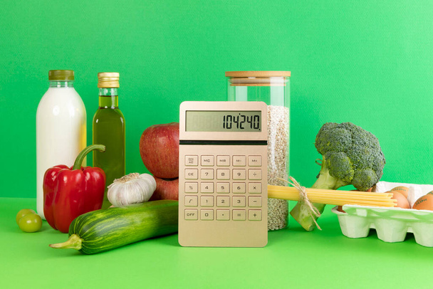conceptual creative photo of monetary inflation, economic recession, crisism, groceries and calculator - Fotoğraf, Görsel