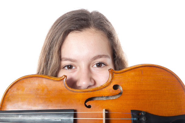 Teenage girl behind violin - Photo, Image