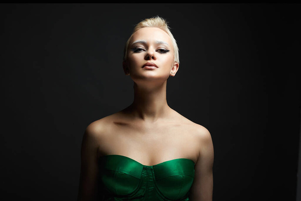 portrait of Short Hair Beautiful young woman with white snow brows. sensual blond girl with fancy makeup. Bald style - Fotografie, Obrázek