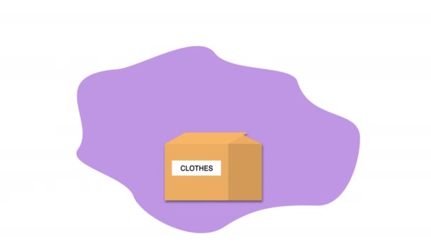 Put the pants, sweater, and T-shirt in an open cardboard box labeled Donate. Second-hand clothes purchased for textile products re-usage the tiny person concept. Collecting second-hand things. Clothes - Footage, Video