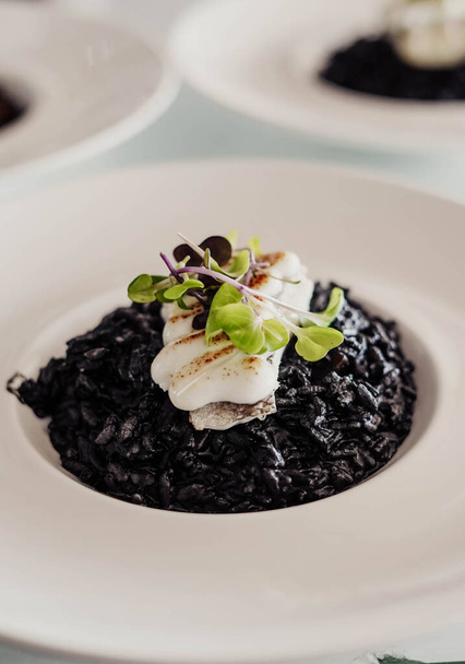Black rice with cuttlefish and squid ink - Fotoğraf, Görsel
