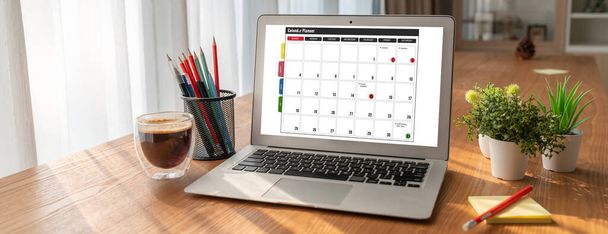 Calendar on computer software application for modish schedule planning for personal organizer and online business - Photo, Image