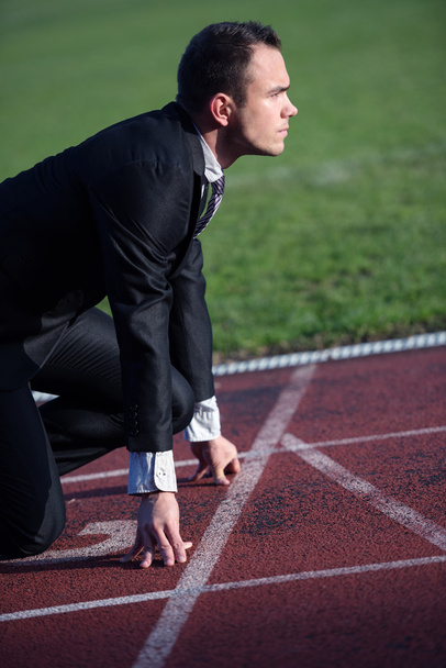 Business man ready to sprint - Foto, imagen