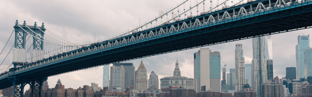 scenic view of skyscrapers and Manhattan bridge in New York City, banner - Fotografie, Obrázek
