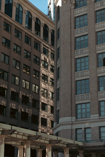 grey stone buildings in midtown of Manhattan in New York City - Zdjęcie, obraz