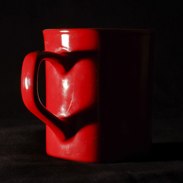 Heart shape from coffee mug handle and it shadow - Zdjęcie, obraz