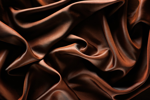Abstract wave textile texture or background in golden brown colo - Photo, Image