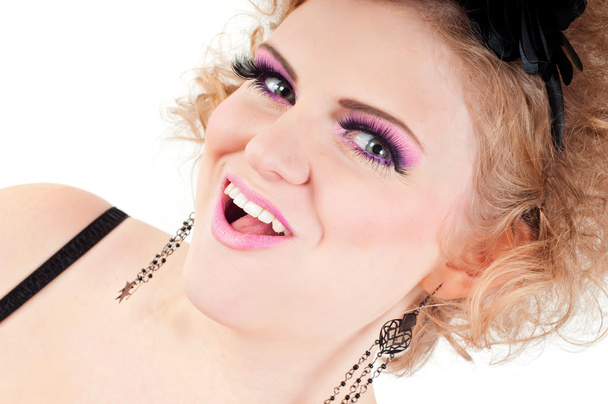 Blonde with fancy make-up grimacing - Foto, immagini