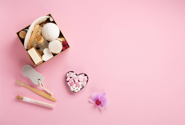 Natural eco friendly beauty skin care products concept. Zero waste bathroom, spa accessories on pink background. Eco friendly self care package for mothers womans day, valentines day, christmas,  - Fotografie, Obrázek
