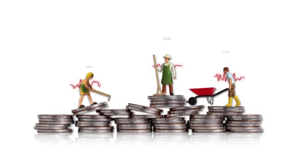 Coins and miniature people. Concept of individual income and economic differences. - Footage, Video