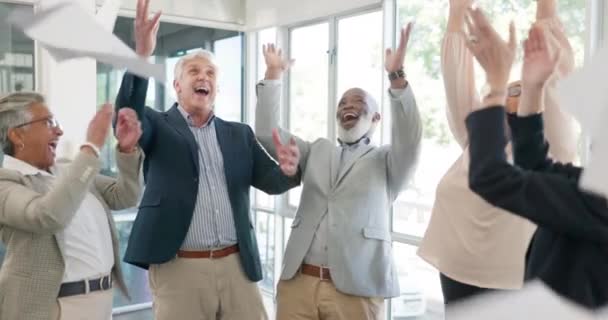 Senior business people, celebration and paper in air for success, goals or clapping in office together. Elderly corporate group, documents and applause for solidarity, diversity or happy in workplace. - Footage, Video