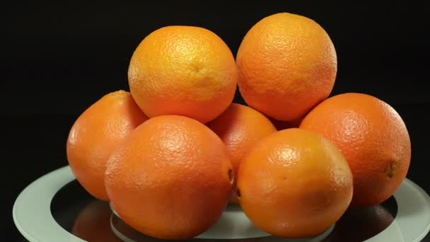 Pomarańczy na obracanie płycie - Materiał filmowy, wideo