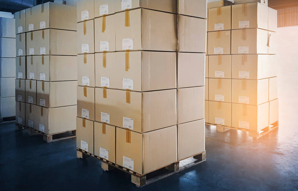Packaging Boxes Stacked on Pallets in Storage Warehouse. Supply Chain. Storehouse Distribution. Cargo Shipping Supplies Warehouse Logistics. - Photo, Image
