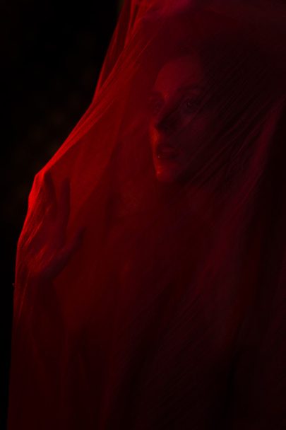 Girl posing with red fabric - Zdjęcie, obraz