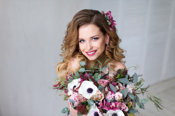 Fashion Beauty Model Girl with Flowers Hair.  - Photo, image