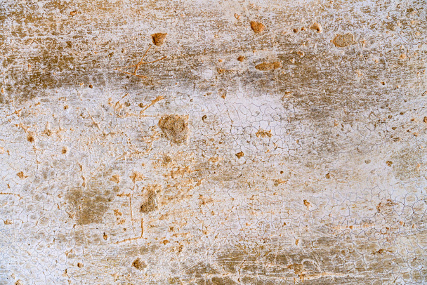 Volledig frame frontale detail foto toont een oude vervallen pleisterwerk oppervlak - Foto, afbeelding