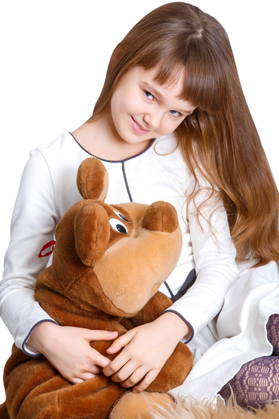Dívka objímající svého medvídka - Fotografie, Obrázek
