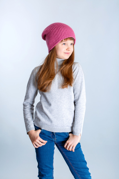 Child girl wearing pink knitted hat - Fotografie, Obrázek