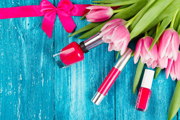 Beautiful pink tulips on blue wood background - Фото, изображение