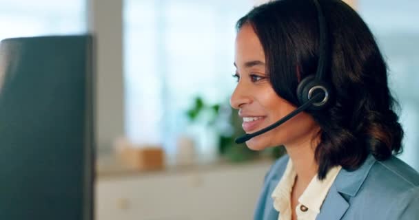Businesswoman, call center and smile for telemarketing, customer support or help advice with headset at the office. Female employee consultant or agent talking and working on computer in online sales. - Felvétel, videó