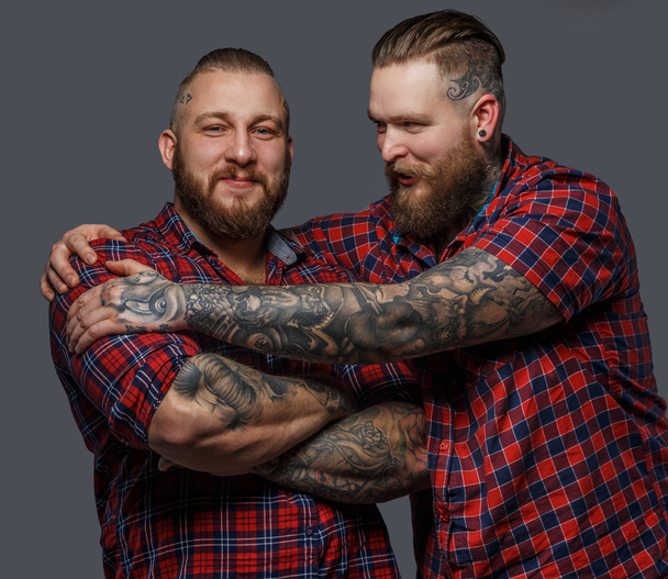 Two brutal males with tattooes and beards - Photo, Image