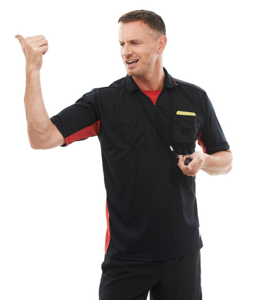 Sports, whistle and male coach in a studio giving instructions, direction or rules for a match. Fitness, workout and professional man referee with a training gesture isolated by a white background - Foto, Imagem