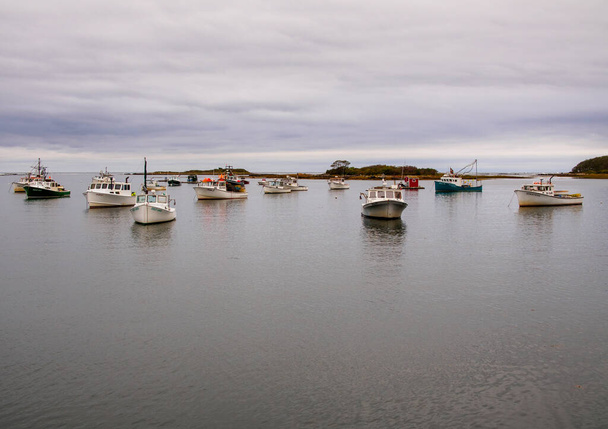 Fishing boats moored in the Atlantic Ocean, in Maine, New England. - Φωτογραφία, εικόνα