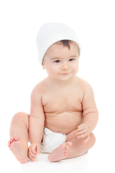 Niedliches Baby in Windel mit Mütze - Foto, Bild