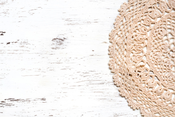 Crochet doily border over shabby chic wood - Foto, immagini