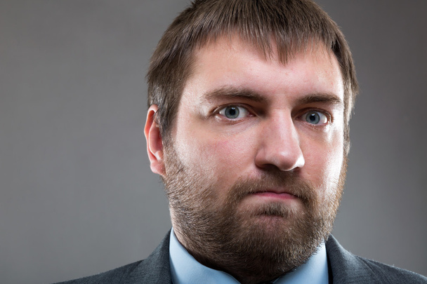 Serious male bearded face close up portrait - Фото, изображение