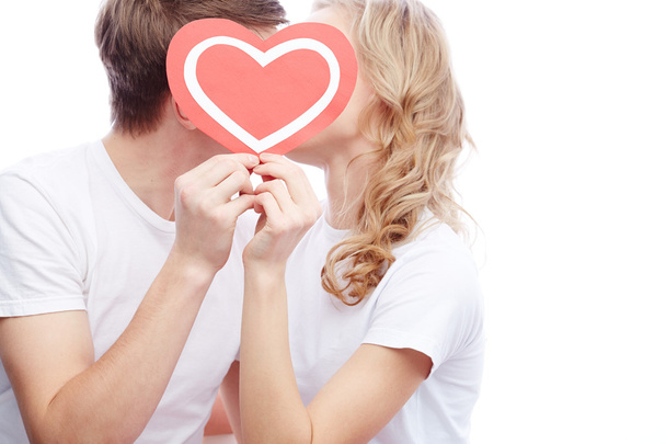 Kissing couple with a heart - Φωτογραφία, εικόνα